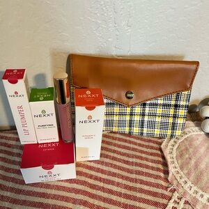 Ipsy cosmetic bag with $110 value
NEXXT and Josie Maran pink blossom lippie